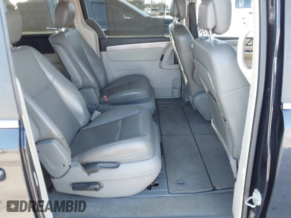2011 Volkswagen Routan SE with VIN 2V4RW3DG5BR668194, listed as a IAAI auction lot 42483379 with 203,945 mi miles and . Bid and sale history available at DreamBid. Image 8.