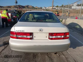 2001 Lexus ES with VIN JT8BF28G210299821, listed as a IAAI auction lot 41539064 with 248,063 mi miles. Bid and sale history available at carsss.com. Image 16.