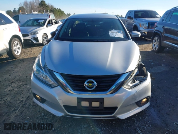 2018 Nissan Altima S with VIN 1N4AL3AP2JC239743, listed as a IAAI auction lot 41683606 with 141,354 mi miles and . Bid and sale history available at DreamBid. Image 12.