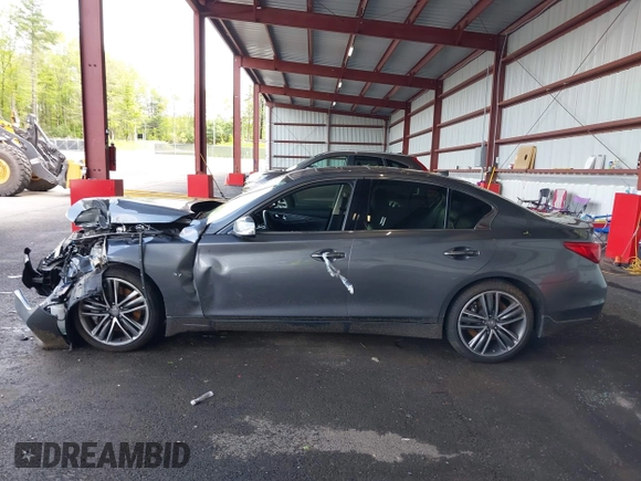 2015 Infiniti Q50 Premium z VIN JN1BV7AR3FM422042, wystawiony jako IAAI lot #42258784 z przebiegiem 72 030 mil mil oraz . Historia ofert i sprzedaży dostępna na DreamBid. Obrazek 14.