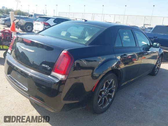 2015 Chrysler 300 with VIN 2C3CCAGG1FH815698, listed as a IAAI auction lot 41853449 with 172,507 mi miles. Bid and sale history available at carsss.com. Image 4.