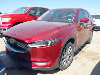 2021 Mazda CX-5 Grand Touring with VIN JM3KFADM4M0476615, listed as a IAAI auction lot 42004814 with 42,483 mi miles. Bid and sale history available at carsss.com. Image 17.