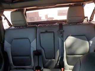 2024 Ford Bronco Big Bend z VIN 1FMDE7BH9RLB50114, wystawiony jako Copart lot #52157635 z przebiegiem 1 002 mil mil oraz Szkoda całkowita • Salvage title. Historia ofert i sprzedaży dostępna na DreamBid. Obrazek 10.