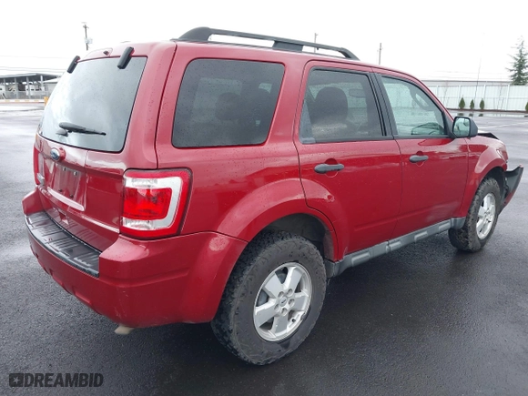 2011 Ford Escape XLT with VIN 1FMCU9D77BKB34262, listed as a IAAI auction lot 41198534 with 212,006 mi miles. Bid and sale history available at carsss.com. Image 4.