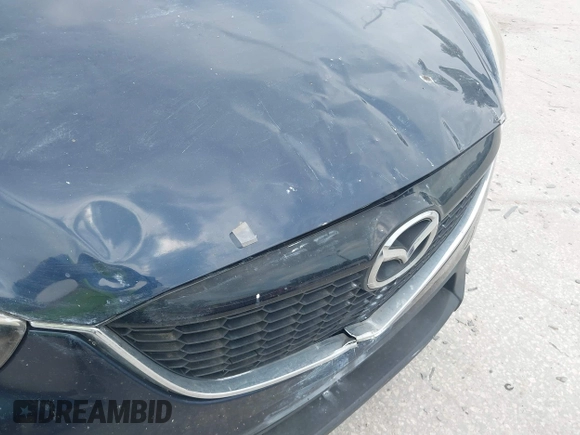 2014 Mazda CX-5 Grand Touring with VIN JM3KE2DY8E0425258, listed as a IAAI auction lot 42179452 with 132,137 mi miles. Bid and sale history available at carsss.com. Image 17.