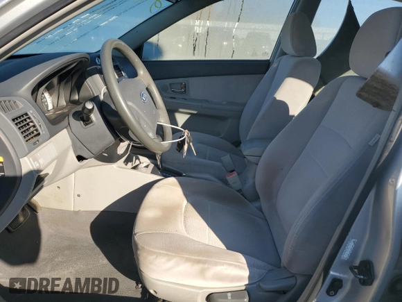 2007 Kia Spectra EX with VIN KNAFE121475450624, listed as a Copart auction lot 77712594 with 100,646 mi miles and Salvage Title. Bid and sale history available at carsss.com. Image 7.