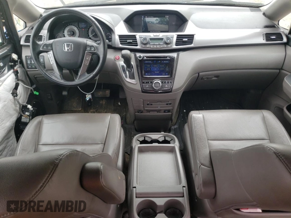 2014 Honda Odyssey Touring with VIN 5FNRL5H90EB014360, listed as a Copart auction lot 56699845 with 180,913 mi miles and Salvage title. Bid and sale history available at DreamBid. Image 8.