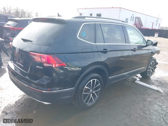 2021 Volkswagen Tiguan SE with VIN 3VV2B7AX7MM050891, listed as a IAAI auction lot 41519674 with 43,318 mi miles. Bid and sale history available at carsss.com. Image 4.