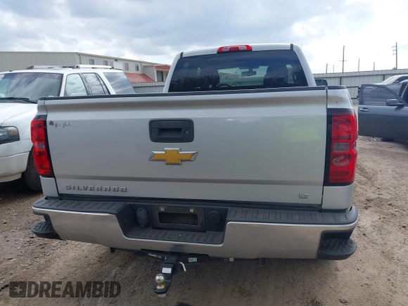2014 Chevrolet Silverado 1500 LT with VIN 1GCRCREH0EZ163493, listed as a IAAI auction lot 41525659 with 218,958 mi miles and . Bid and sale history available at DreamBid. Image 16.