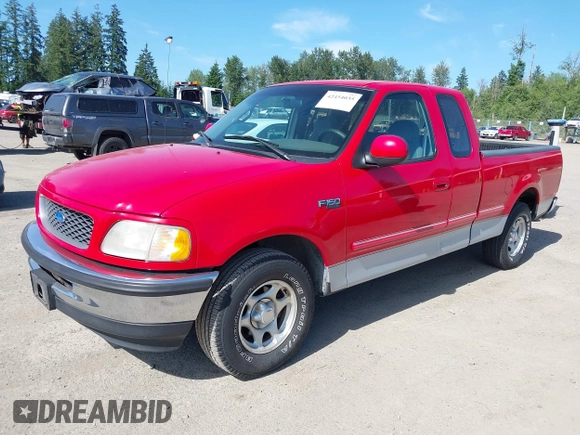 1997 Ford F-150 with VIN 2FTEX17L9VCA27687, listed as a IAAI auction lot 42454035 with 122,179 mi miles and . Bid and sale history available at DreamBid. Image 2.