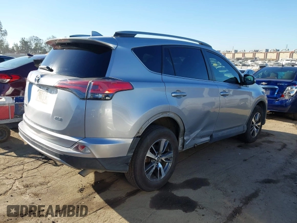 2018 Toyota RAV4 XLE with VIN 2T3WFREV8JW474230, listed as a IAAI auction lot 42687475 with 182,264 mi miles and . Bid and sale history available at DreamBid. Image 4.