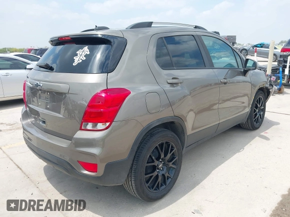 2021 Chevrolet Trax LT with VIN KL7CJLSBXMB359468, listed as a IAAI auction lot 41982149 with 199,685 mi miles and . Bid and sale history available at DreamBid. Image 4.