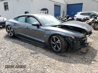 2022 Audi e-tron GT Premium Plus z VIN WAUCJBFW5N7004381, wystawiony jako Copart lot #63516494 z przebiegiem Nie podano mil oraz Szkody całkowita. Historia ofert i sprzedaży dostępna na DreamBid. Obrazek 4.