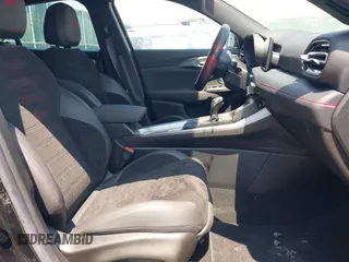 2024 Dodge Hornet GT Plus with VIN ZACNDFBNXR3A24875, listed as a IAAI auction lot 42227569 with 12,173 mi miles and . Bid and sale history available at DreamBid. Image 5.