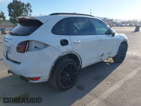 2013 Porsche Cayenne GTS with VIN WP1AD2A22DLA71143, listed as a IAAI auction lot 41287138 with 143,434 mi miles and . Bid and sale history available at DreamBid. Image 4.