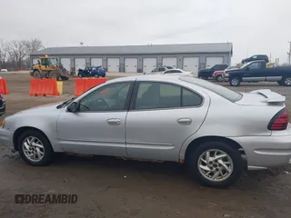 2003 Pontiac Grand Am SE1 with VIN 1G2NF52E43M684966, listed as a IAAI auction lot 41534135 with 91,049 mi miles. Bid and sale history available at carsss.com. Image 14.