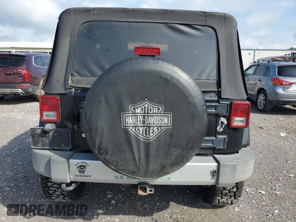 2011 Jeep Wrangler Sahara with VIN 1J4AA5D15BL552185, listed as a Copart auction lot 63065185 with 159,850 mi miles and Salvage title. Bid and sale history available at DreamBid. Image 6.