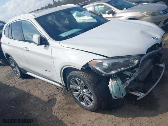 2017 BMW X1 xDrive28i with VIN WBXHT3Z30H4A64932, listed as a IAAI auction lot 41779359 with 72,612 mi miles. Bid and sale history available at carsss.com. Image 1.