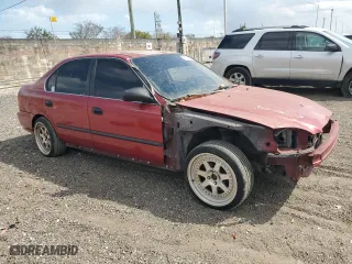 1997 Honda Civic LX "O" w/Air with VIN 1HGEJ6674VL030992, listed as a Copart auction lot 49231255 with 123,617 mi miles and Salvage Title. Bid and sale history available at carsss.com. Image 4.