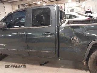2017 GMC Sierra 1500 SLE z VIN 1GTV2MEC2HZ194077, wystawiony jako IAAI lot #41509400 z przebiegiem Nie podano mil oraz . Historia ofert i sprzedaży dostępna na DreamBid. Obrazek 14.