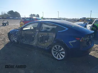 2019 Tesla Model 3 Long Range with VIN 5YJ3E1EB7KF454636, listed as a IAAI auction lot 41853972 with 56,916 mi miles. Bid and sale history available at carsss.com. Image 3.