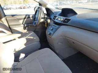 2014 Honda Odyssey LX with VIN 5FNRL5H24EB001131, listed as a IAAI auction lot 41753911 with 238,080 mi miles. Bid and sale history available at carsss.com. Image 5.