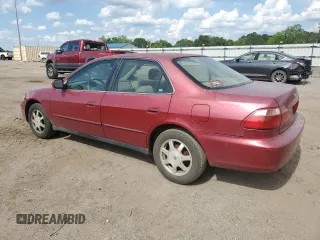 2000 Honda Accord SE with VIN JHMCG5673YC023811, listed as a Copart auction lot 56331885 with 194,416 mi miles and Salvage title. Bid and sale history available at DreamBid. Image 2.