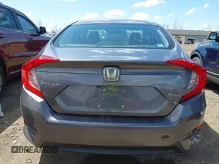 2018 Honda Civic LX with VIN 2HGFC2F5XJH586527, listed as a IAAI auction lot 42080372 with 52,114 mi miles and . Bid and sale history available at DreamBid. Image 17.