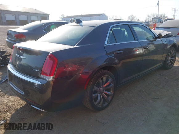 2016 Chrysler 300 Limited with VIN 2C3CCAAG2GH123881, listed as a IAAI auction lot 40713271 with 185,812 mi miles. Bid and sale history available at carsss.com. Image 4.