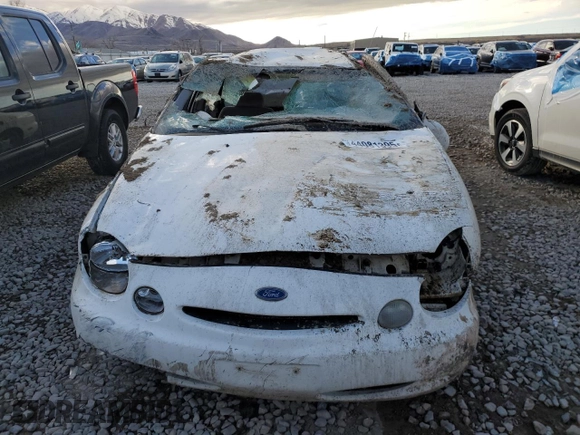 1997 Ford Taurus GL z VIN 1FALP52U1VG253340, wystawiony jako Copart lot #44081395 z przebiegiem 210 117 mil mil oraz Szkoda całkowita • Salvage title. Historia ofert i sprzedaży dostępna na DreamBid. Obrazek 5.