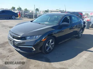 2020 Honda Civic LX with VIN 2HGFC2F67LH574850, listed as a IAAI auction lot 40429352 with 41,063 mi miles and . Bid and sale history available at DreamBid. Image 2.