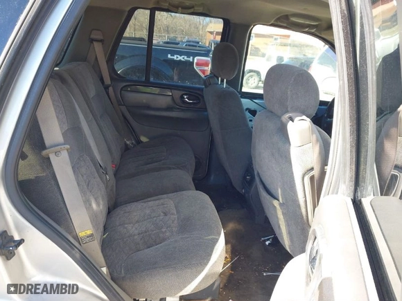 2004 GMC Envoy SLE with VIN 1GKDT13S842134524, listed as a IAAI auction lot 41610041 with 217,166 mi miles. Bid and sale history available at carsss.com. Image 8.