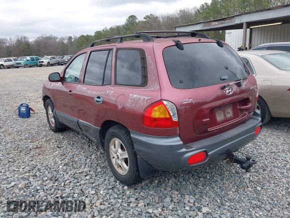 2002 Hyundai Santa Fe GLS with VIN KM8SC73D72U306997, listed as a IAAI auction lot 41519773 with 244,398 mi miles. Bid and sale history available at carsss.com. Image 3.