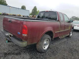 1997 Ford F-150 XL with VIN 1FTDX18W6VKC64721, listed as a Copart auction lot 57935585 with 180,222 mi miles and Clean title. Bid and sale history available at DreamBid. Image 3.
