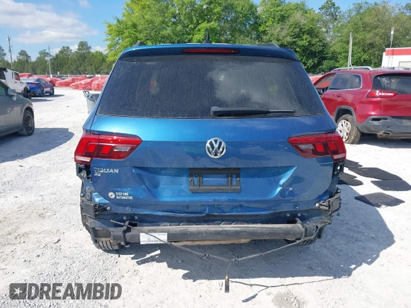 2019 Volkswagen Tiguan SE with VIN 3VV3B7AX2KM006055, listed as a IAAI auction lot 42023713 with 83,570 mi miles and . Bid and sale history available at DreamBid. Image 6.
