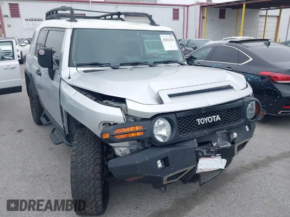 2007 Toyota FJ Cruiser with VIN JTEBU11F370036941, listed as a IAAI auction lot 42024330 with 164,703 mi miles. Bid and sale history available at carsss.com. Image 1.