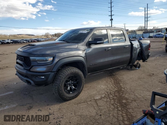 2021 Ram 1500 TRX with VIN 1C6SRFU98MN741605, listed as a Copart auction lot 84763114 with 40,065 mi miles and Salvage Title. Bid and sale history available at carsss.com. Image 1.