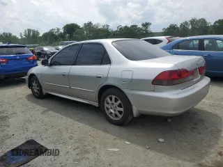 2001 Honda Accord LX z VIN 1HGCG564X1A135855, wystawiony jako Copart lot #57346815 z przebiegiem 235 585 mil mil oraz Szkoda całkowita • Salvage title. Historia ofert i sprzedaży dostępna na DreamBid. Obrazek 2.
