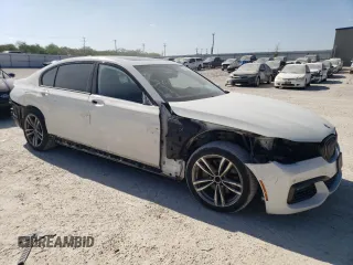 2018 BMW 7 Series 740i with VIN WBA7E2C58JG741652, listed as a Copart auction lot 57802073 with 79,441 mi miles. Bid and sale history available at carsss.com. Image 4.