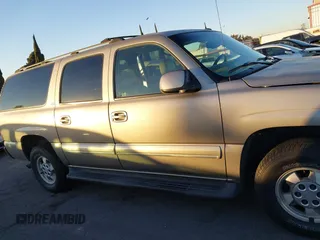 2003 Chevrolet Suburban LS with VIN 1GNEC16T43J269726, listed as a IAAI auction lot 41109855 with 122,820 mi miles. Bid and sale history available at carsss.com. Image 13.