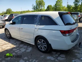 2017 Honda Odyssey Touring с VIN 5FNRL5H96HB015940, выставлен на аукционе Copart как лот 53110764 с пробегом 124 819 миль миль и Списание • Salvage title. История ставок и продаж доступна на DreamBid. Изображение 2.