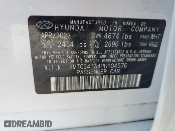 2023 Genesis G70 2.0T with VIN KMTG34TA4PU104576, listed as a Copart auction lot 85082044 with 28,821 mi miles and Salvage Title. Bid and sale history available at DreamBid. Image 13.