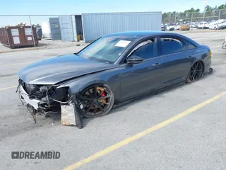 2022 Audi S8 with VIN WAULSAF83NN001905, listed as a IAAI auction lot 41813861 with 18,461 mi miles and . Bid and sale history available at DreamBid. Image 2.