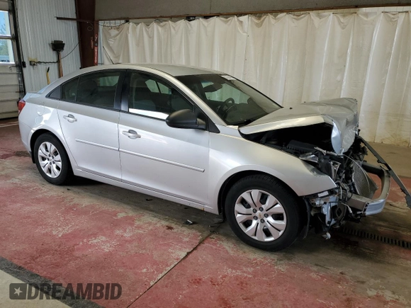 2015 Chevrolet Cruze LS with VIN 1G1PA5SG0F7185162, listed as a Copart auction lot 57080495 with 63,811 mi miles and Salvage Title. Bid and sale history available at DreamBid. Image 4.