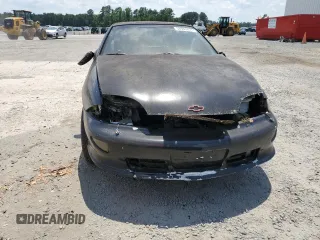 1998 Chevrolet Cavalier with VIN 1G1JF12TXW7102446, listed as a Copart auction lot 58949874 with 70,650 mi miles and Clean Title. Bid and sale history available at DreamBid. Image 5.