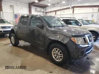 2015 Nissan Frontier Pro-4X with VIN 1N6AD0EV8FN703027, listed as a Copart auction lot 55217005 with 175,794 mi miles and Salvage title. Bid and sale history available at DreamBid. Image 4.
