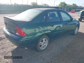 2001 Ford Focus SE with VIN 1FAFP34301W153462, listed as a IAAI auction lot 42000065 with 121,946 mi miles and . Bid and sale history available at carsss.com. Image 4.
