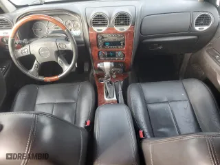 2005 GMC Envoy Denali with VIN 1GKET63M652353972, listed as a Copart auction lot 43690635 with 113,630 mi miles and Clean Title. Bid and sale history available at carsss.com. Image 8.