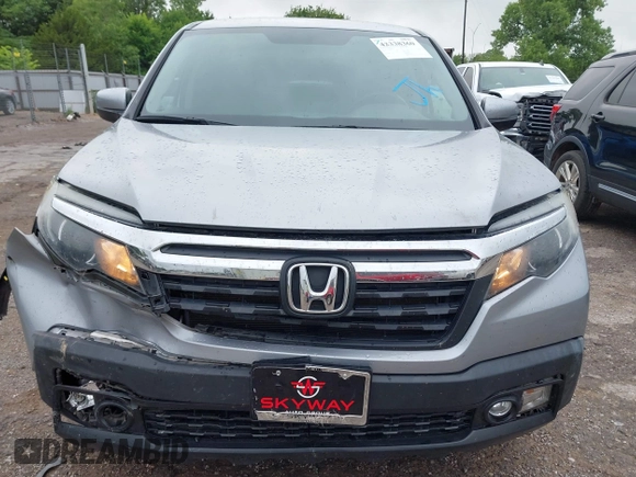2018 Honda Ridgeline RTL with VIN 5FPYK3F52JB002649, listed as a IAAI auction lot 42338360 with 68,802 mi miles and . Bid and sale history available at DreamBid. Image 6.