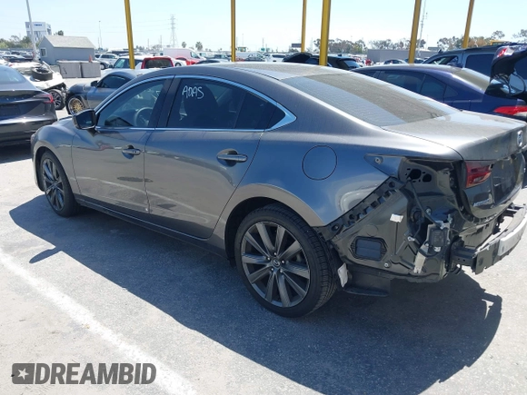 2018 Mazda Mazda6 Touring with VIN JM1GL1VM1J1320592, listed as a IAAI auction lot 41985616 with 100,920 mi miles. Bid and sale history available at carsss.com. Image 3.